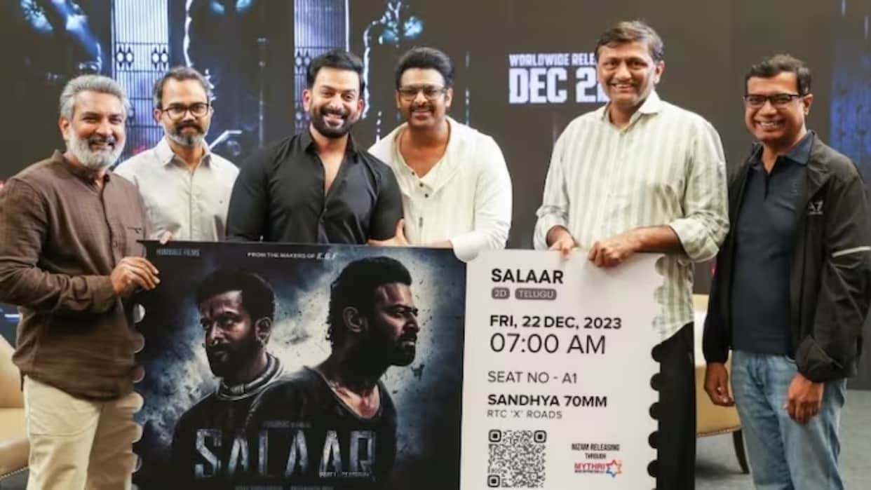 SS Rajamouli Buys First Ticket of Prabhas Prashanth Neel Salaar part 1 Ceasefire Photo went Viral