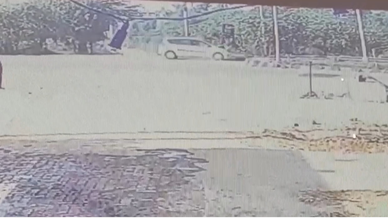 The car ran over a bike rider crossing the road after filling petrol.