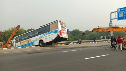 Sleeper bus hangs on divider due to tire burst passengers scream