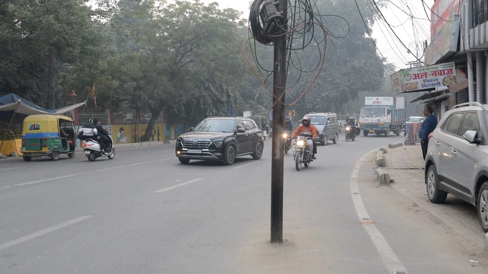 Electric poles on the road people lives in danger
