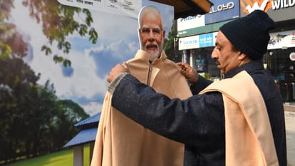 srinagar: Ramp walk at Lal Chowk PM Modi cutout worn with cashmere pheran