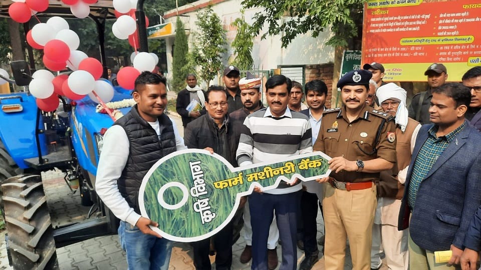 Aligarh DM Indra Vikram Singh and SSP Kalanidhi Naithani drove the tractor