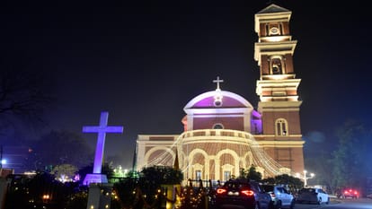 Merry Christmas: Jesus born as the light of the world, churches bathed in light, competition to light candles