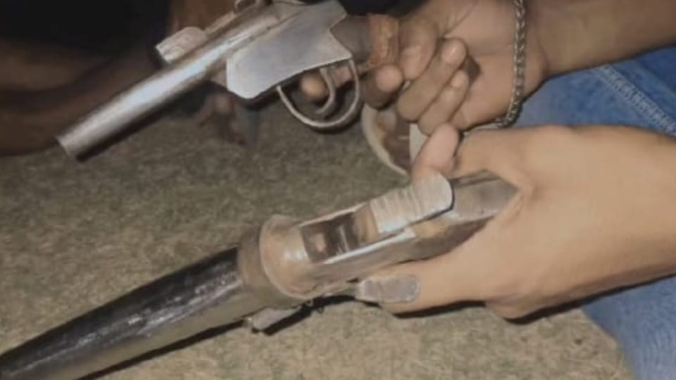 young man showing pistol photos goes viral in Bareilly