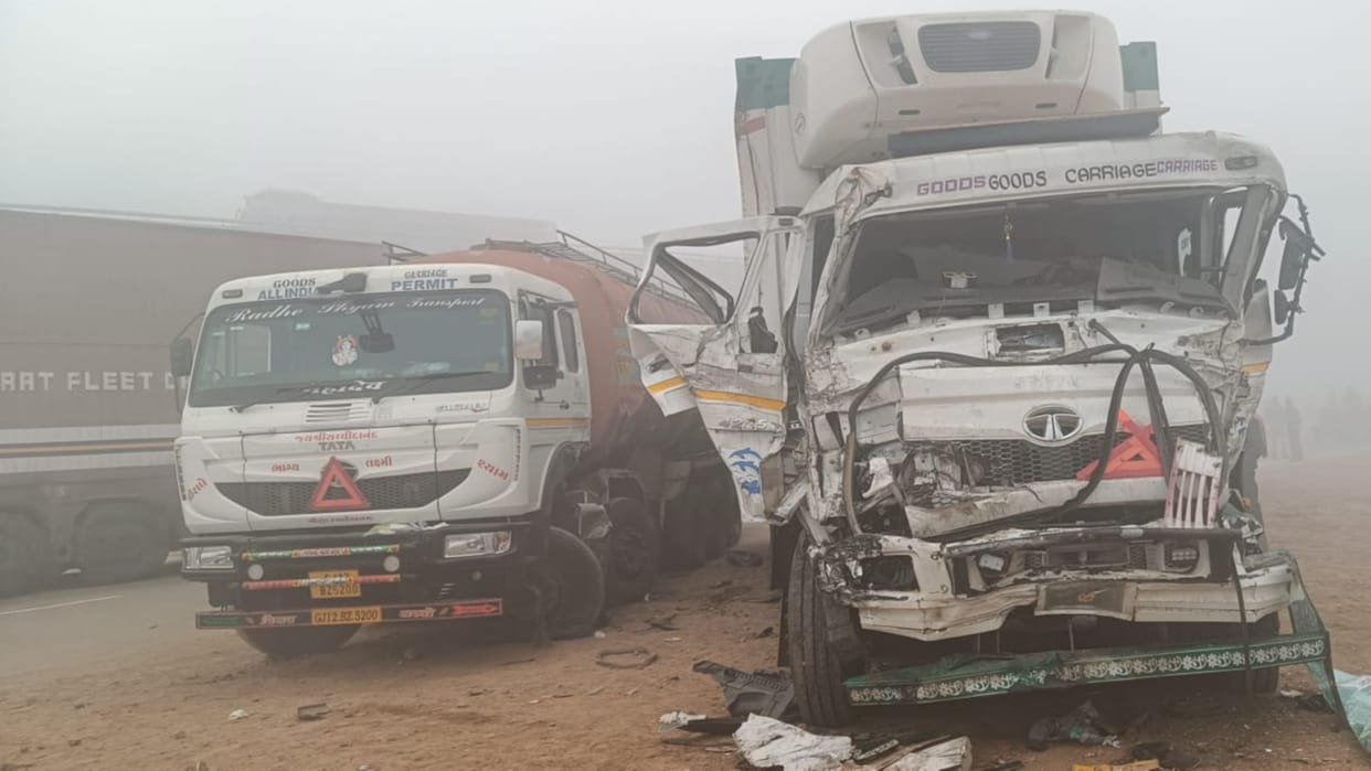 Two students riding a bike died after coming between a dumper and a container