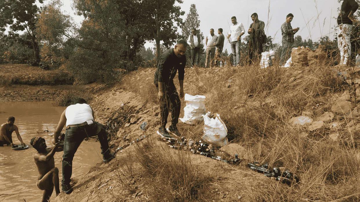 Liquor bottles taken out from pond in Banka
