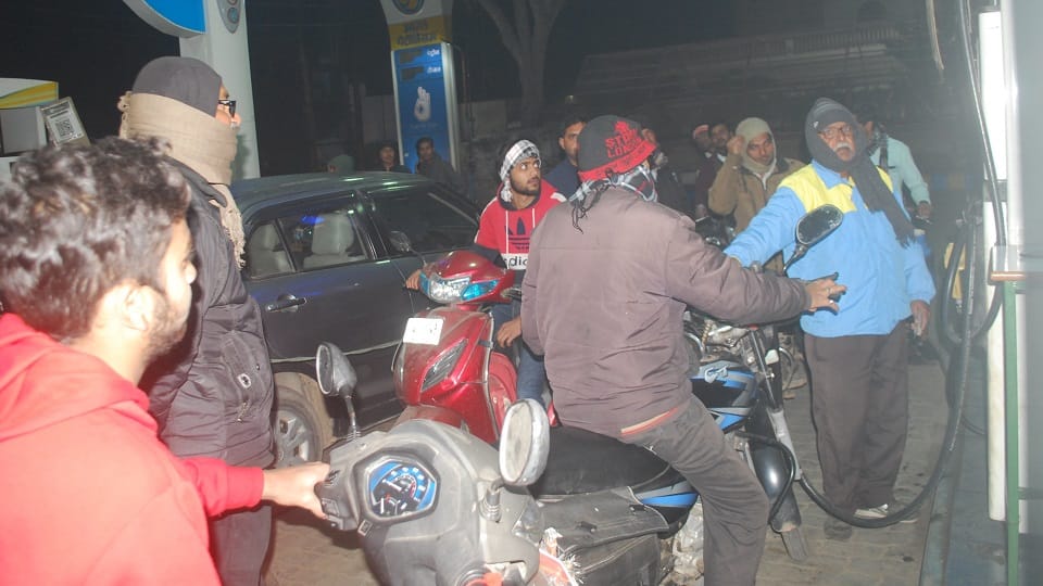 Long queues at petrol pumps