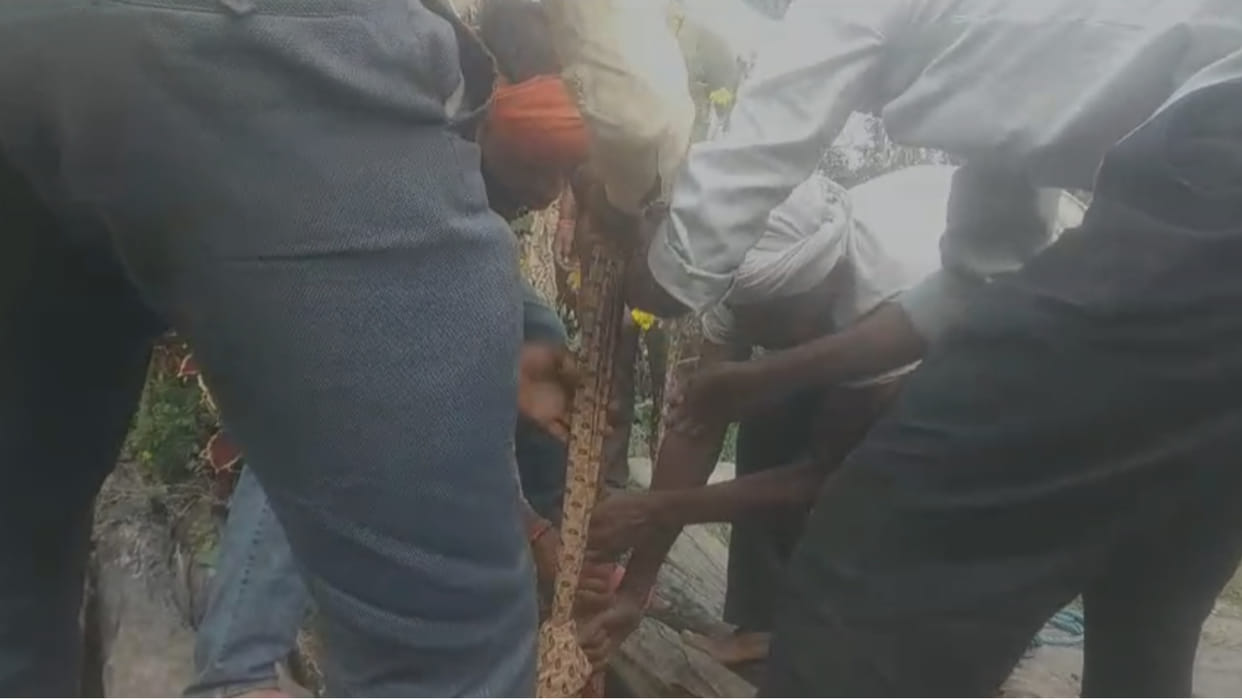 Dead body of a young man found hanging in a well