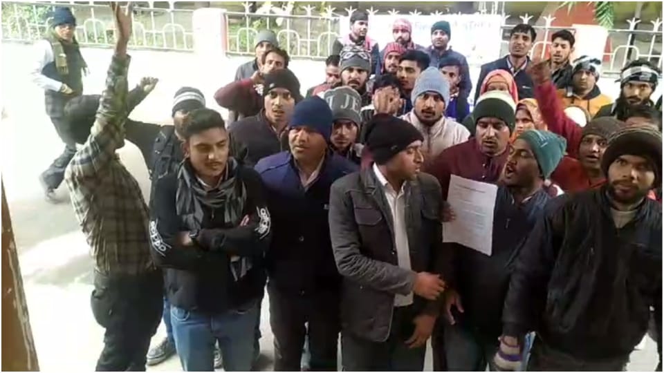 Rajiv Gandhi friends protest outside Collectorate office demand reinstatement