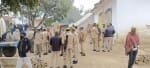 गांव में भारी पुलिस बल तैनात।