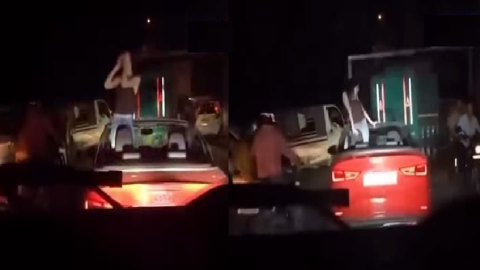 Video of girl dancing in middle of road while standing in an open car goes viral