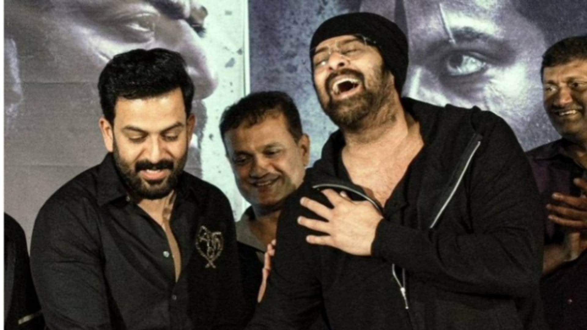 salaar Success Party Prithviraj Sukumaran Prabhas Prashanth Neel cut a cake Pictures goes viral on Internet