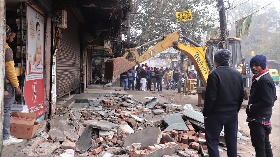 Municipal Corporation's bulldozer runs on illegal construction