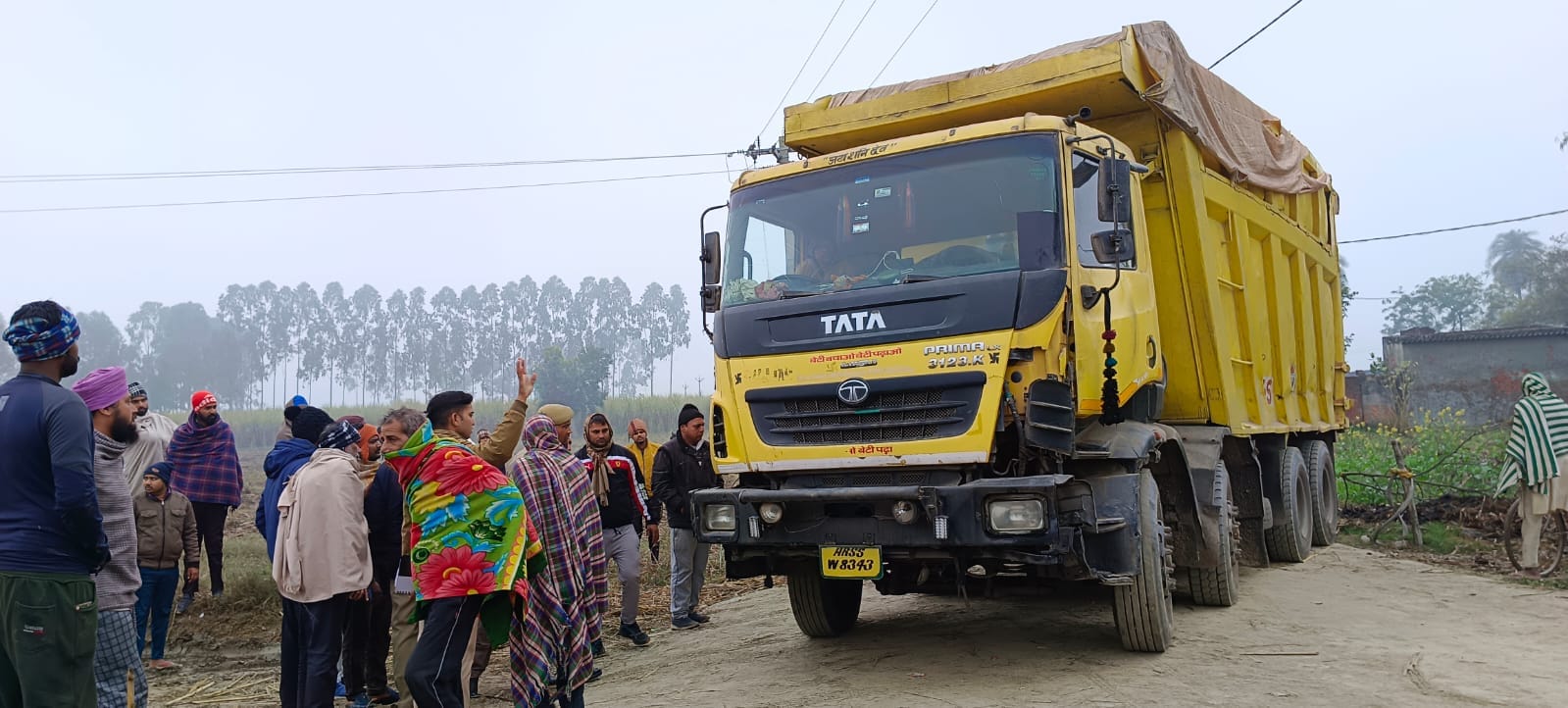 Tragic accident: Woman fell down from bike after collision, overloaded truck passed over her, dies