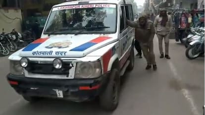 policemen pushing the car video goes viral in Lakhimpur kheri
