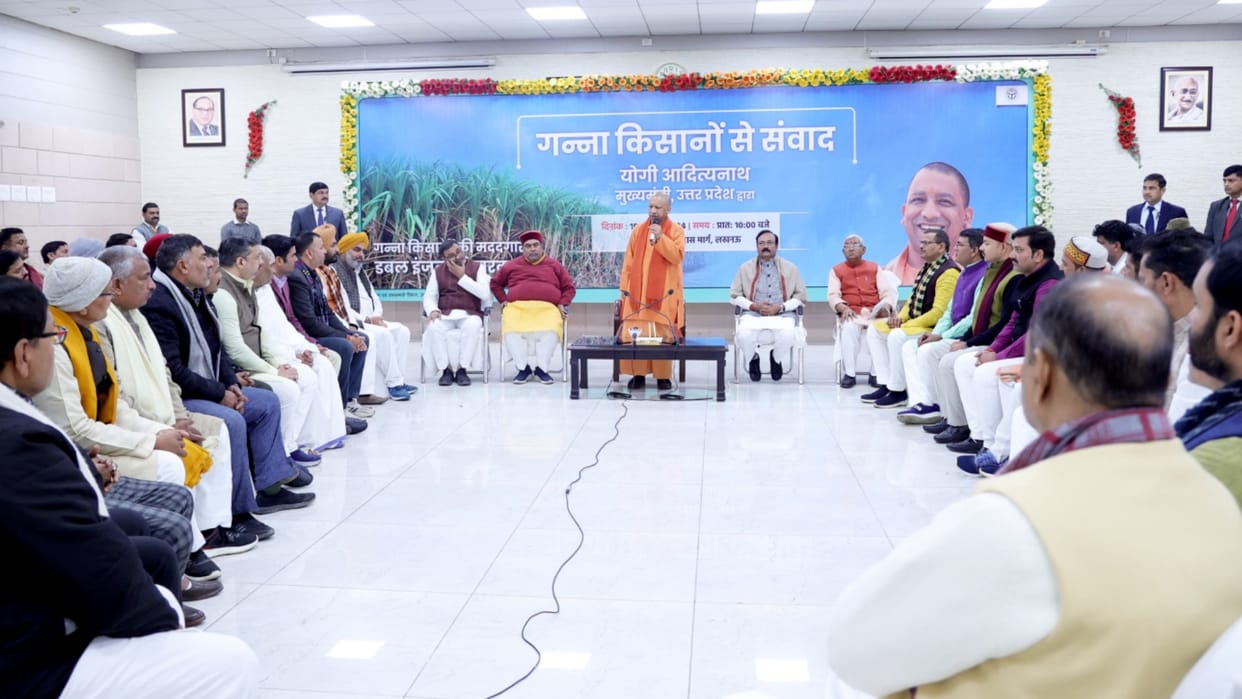 CM Yogi Adityanath talks to sugercane farmers in Lucknow.