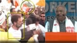 राहुल गांधी  के करीब भाजपा का झंडा लेकर पहुंचे लोग, कांग्रेस प्रमुख मल्लिकार्जुन खरगे (दाहिने)