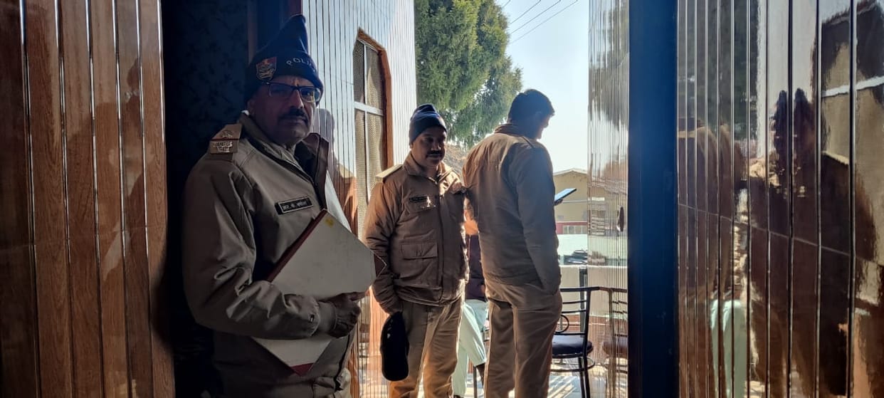 Mussoorie Police encounter Weapons stuck in police waistband Two Officials Suspended