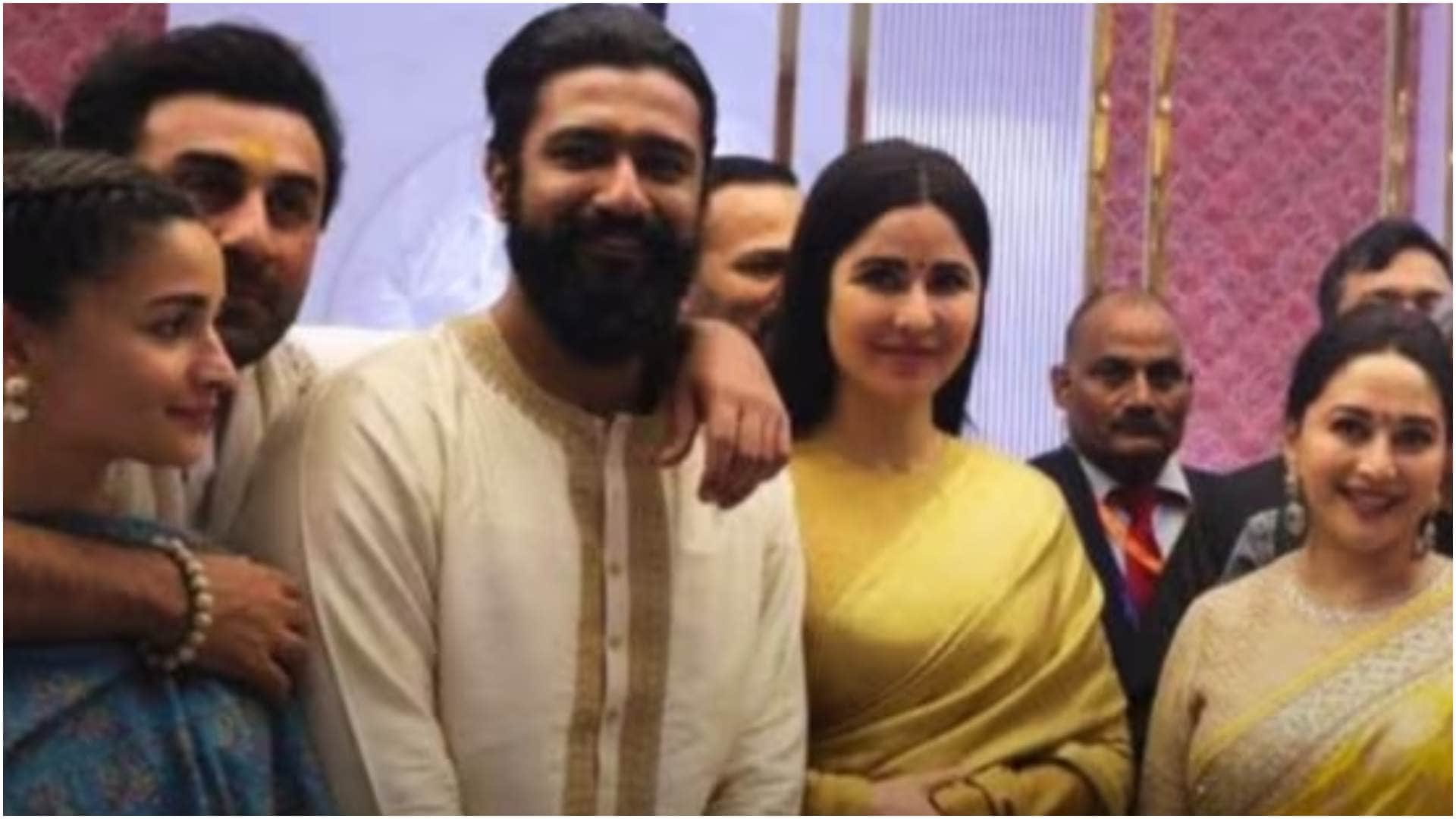 Ranbir kapoor puts his arm around vicky kaushal as they pose at Ayodhya Ram Mandir with other bollywood celebs
