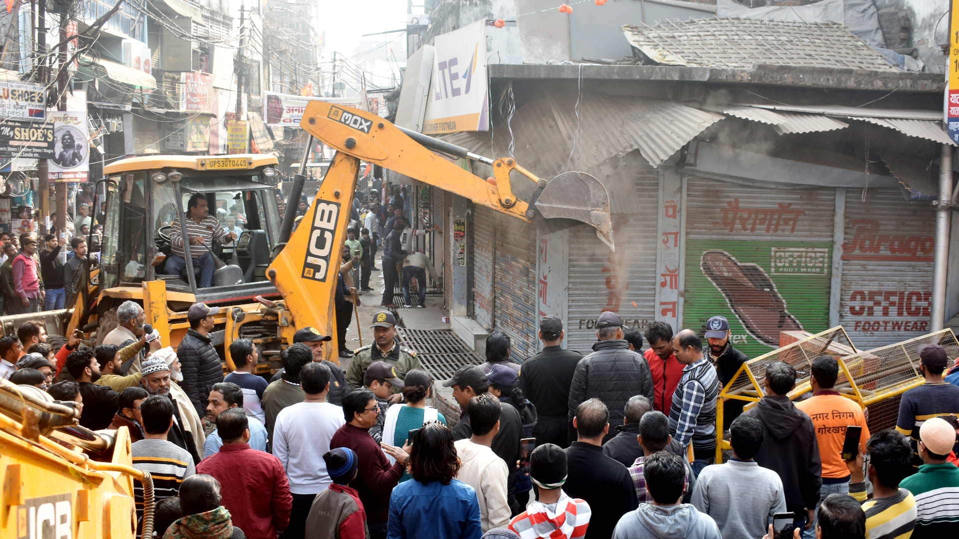 Bulldozer started: Townhall corridor vacated...Golghar still left