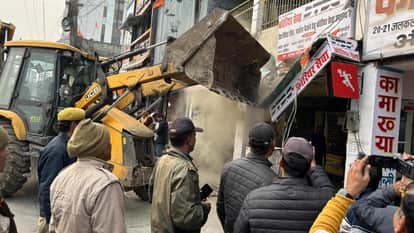 Bulldozer started: Townhall corridor vacated...Golghar still left