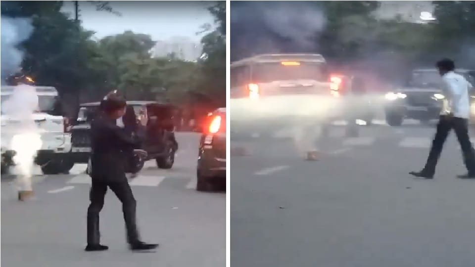 Youths burst fireworks after stopping their car in middle of road in Sector 50 of Noida