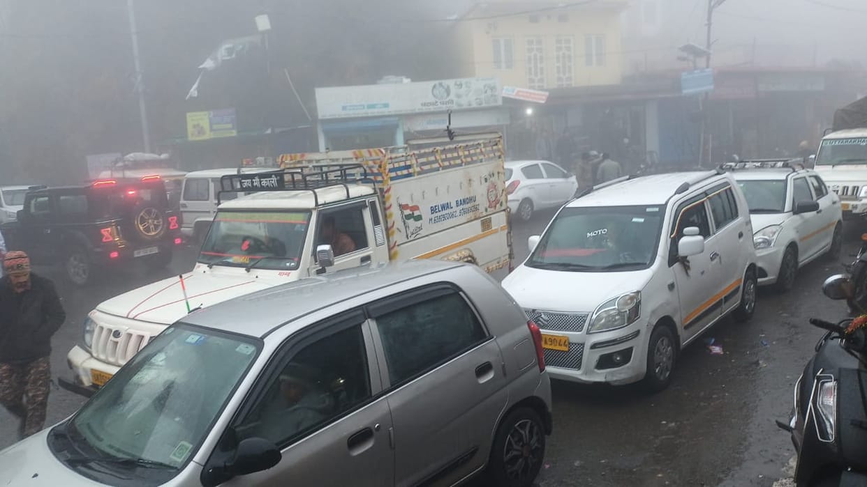 Uttarakhand Snowfall Tourist Crowd in Mussoorie Chakrata held Huge traffic jam Photos
