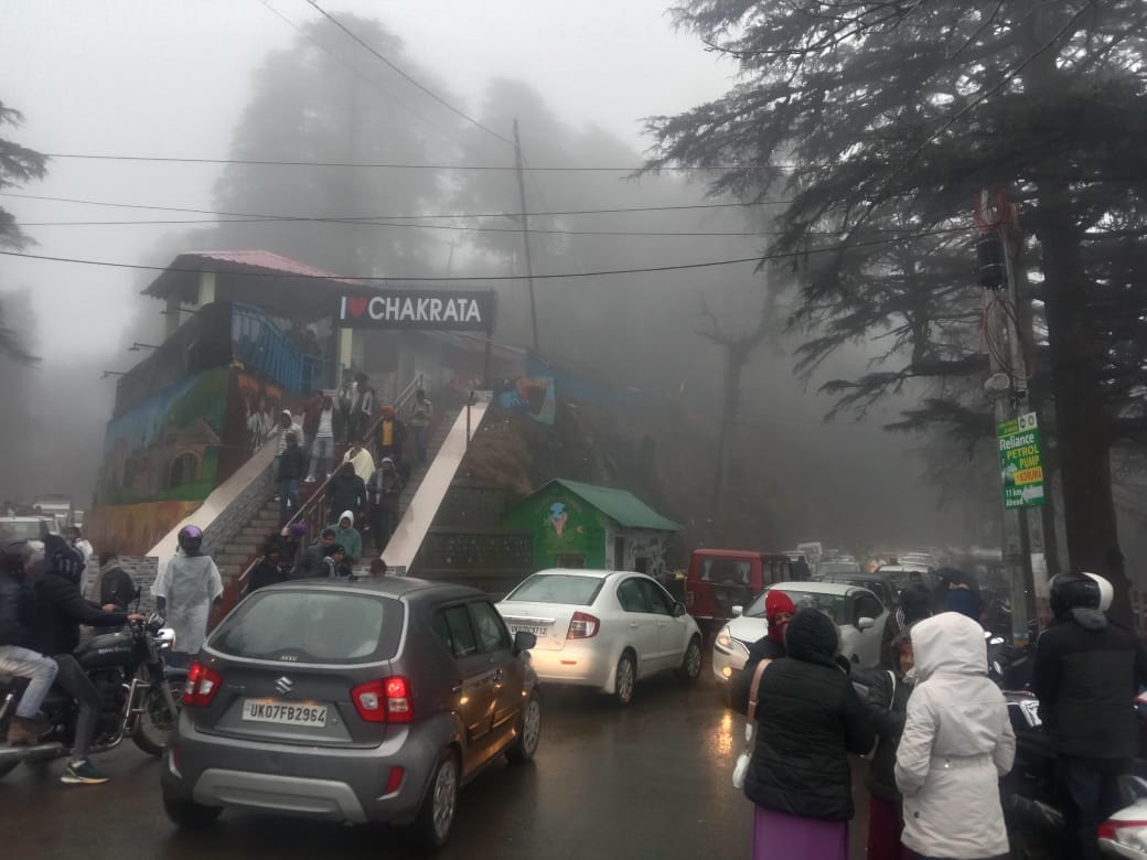 Uttarakhand Snowfall Tourist Crowd in Mussoorie Chakrata held Huge traffic jam Photos