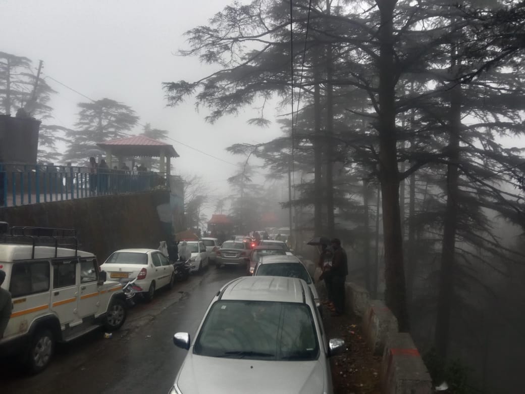 Uttarakhand Snowfall Tourist Crowd in Mussoorie Chakrata held Huge traffic jam Photos