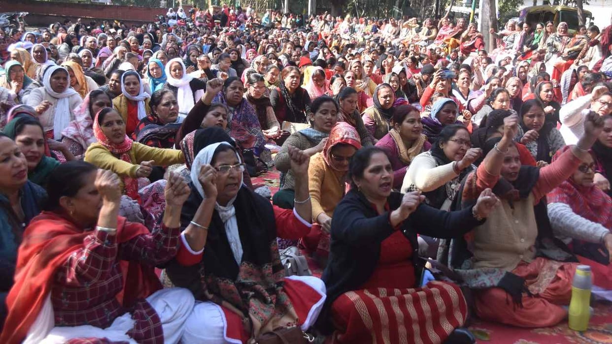 Anganwadi workers protest outside the residence of MP Ravneet Singh Bittu