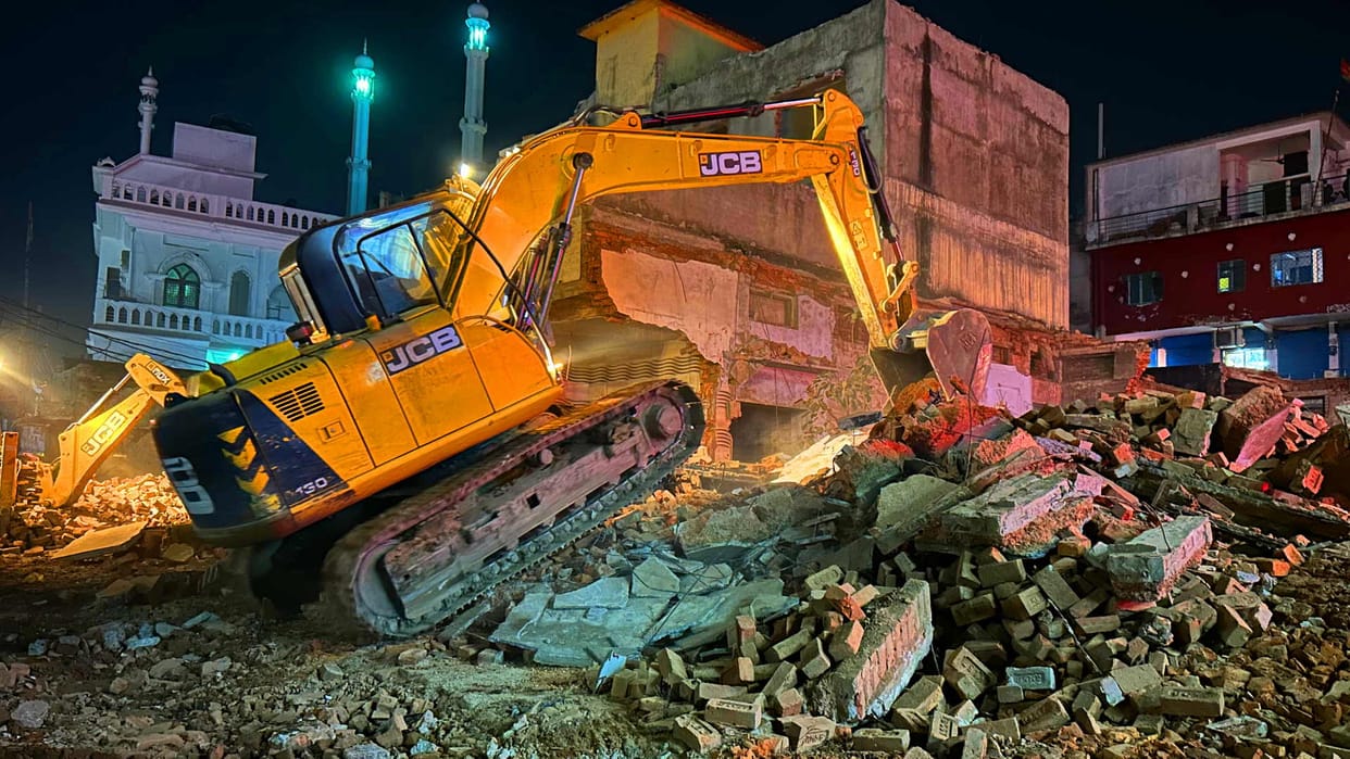Demolition of remaining shops for multilevel parking