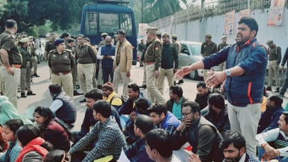 Applicants protest near basic education minister house in Lucknow.