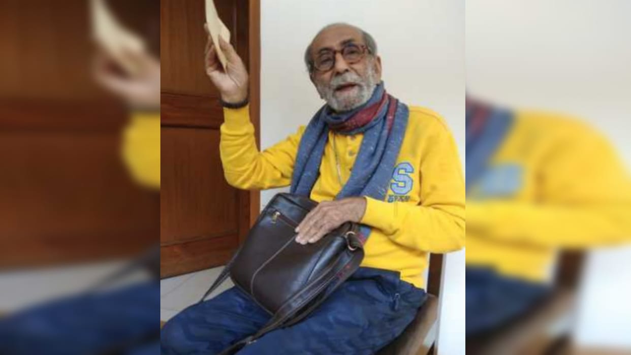 Abid Surti became happy after enjoying the Magh Mela...and eating Ramphal.