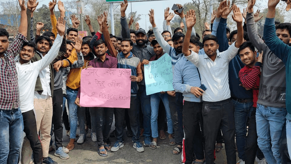 candidates marched on foot and surrounded SP office over UP Police exam fraud in Hapur