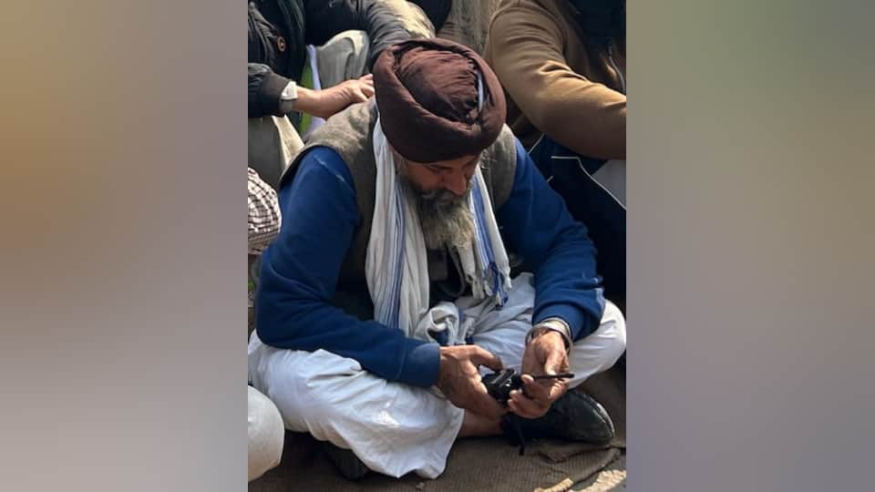 Farmers stood on border even in bad weather mobile and net closed instructions being through walkie-talkie