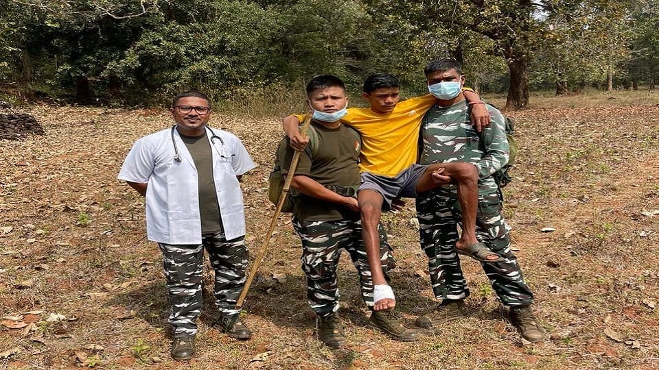 Soldiers treated a young man who was caught in a booby trap in Bijapur