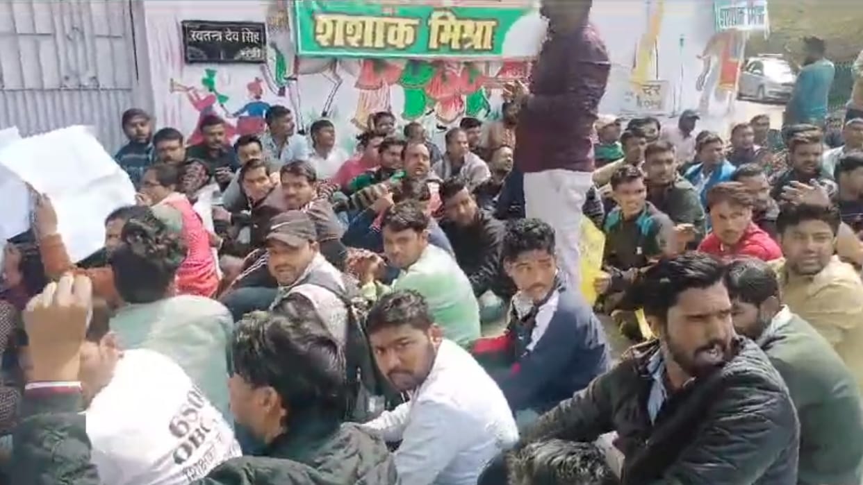 Youth protest near UP minister Swatanra Dev Singh's house in Lucknow.