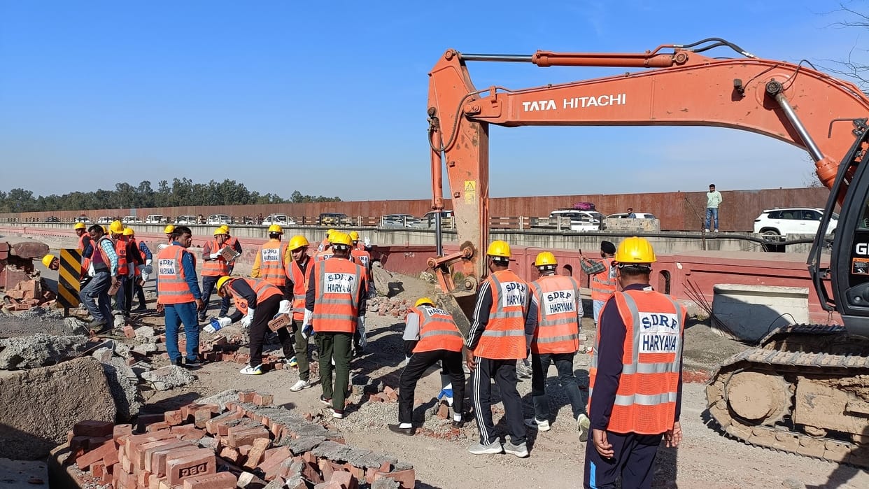 Barricading removed with JCB on National Highway 44 Link Road