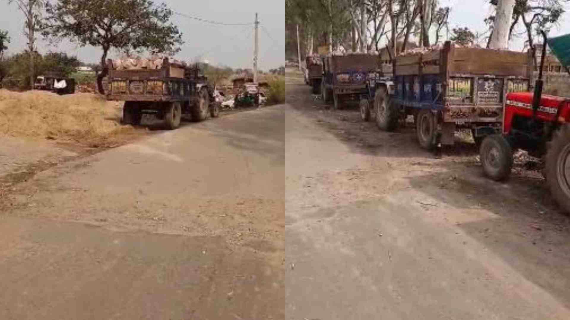 पत्थरों से भरी ट्रैक्टर ट्रॉली।