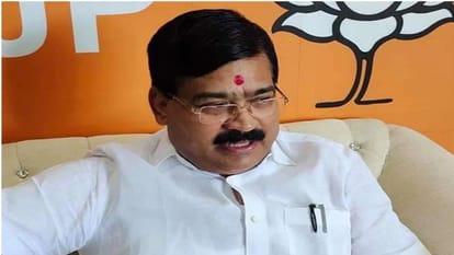 Posters pasted against BJP MP Sangamlal Gupta, warning of fierce opposition in the elections.