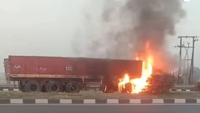 dumper collided with divider due to tire burst and caught fire In Firozabad