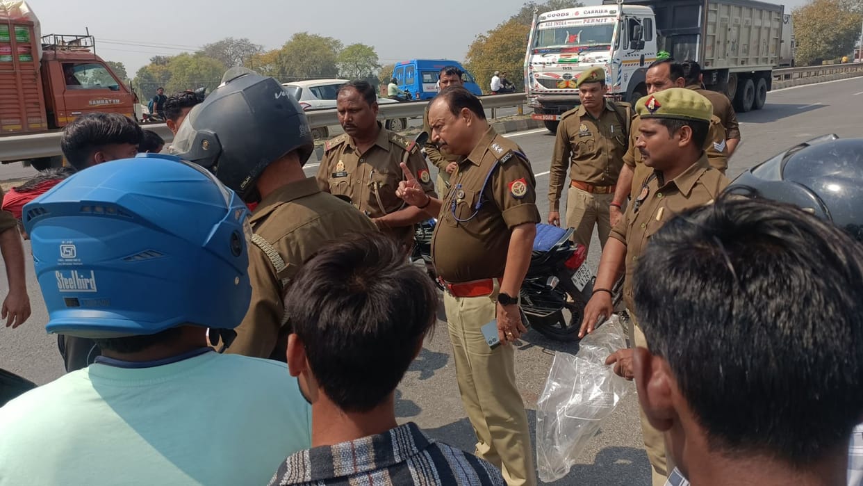 woman dies road accident helmet saves young man life Truck hits bike in varanasi