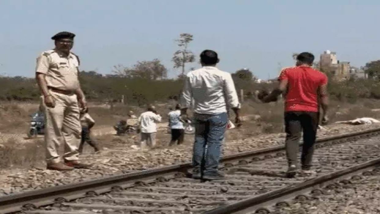 Mother and daughter sitting on railway track in Rewari, train passed over them