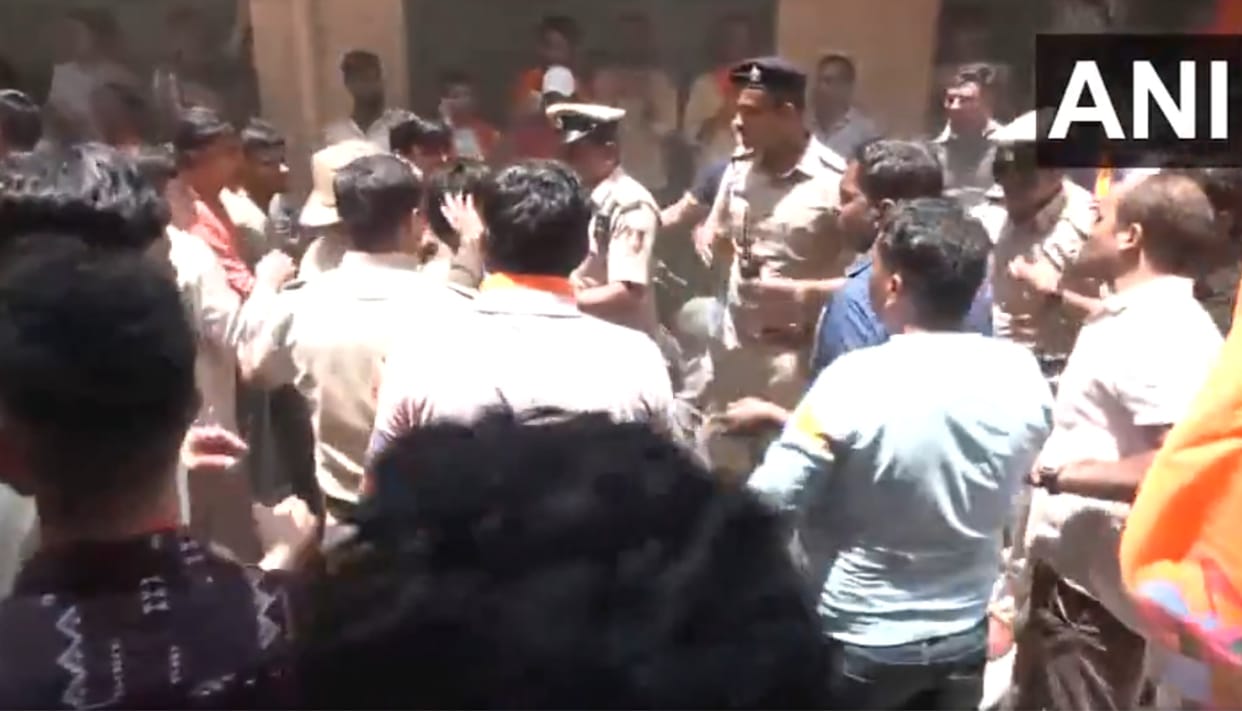 karnataka bengaluru protest errupt after shopkeeper beaten for played devotional song politics on matter