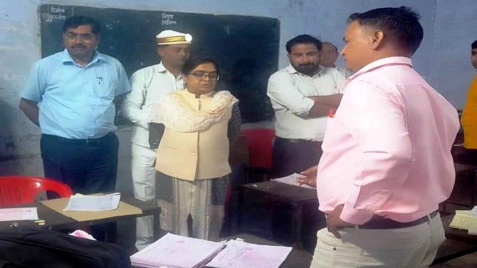 Mobile found with examiner during evaluation of answer sheets