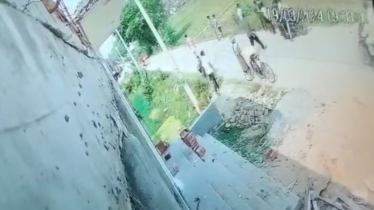 four people suddenly attacked young man he injured him beating a stick.