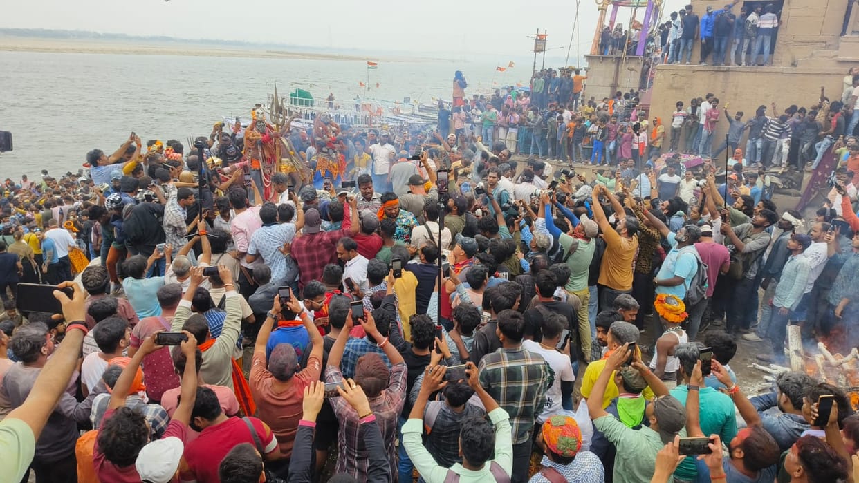 Holi 2024 celebration devotees play pyre ashes at Harishchandra Ghat Varanasi
