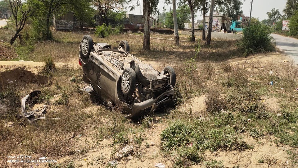 car went out of control and overturned
