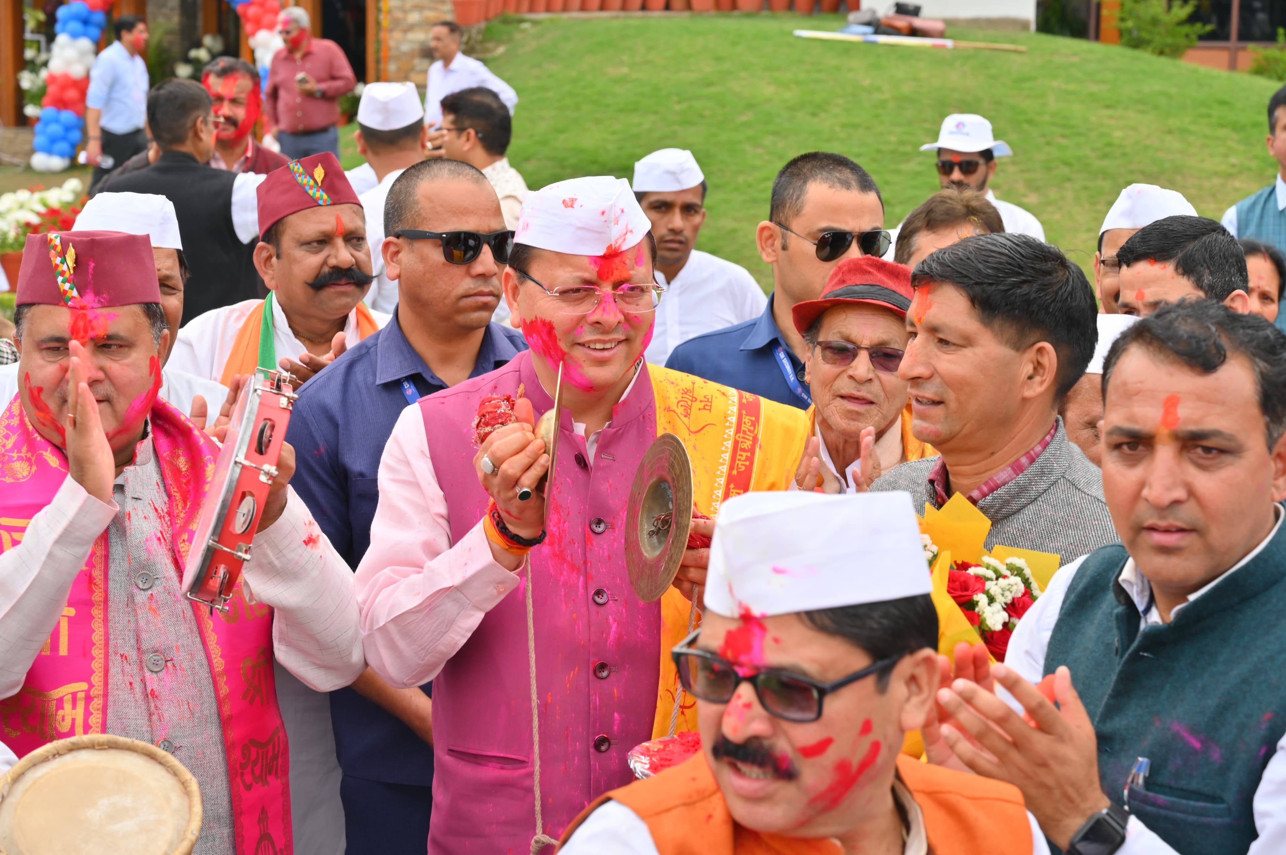 Holi 2024 Uttarakhand CM Dhami Play Holi in CM residence Sing songs with Dhol-Damau Photos
