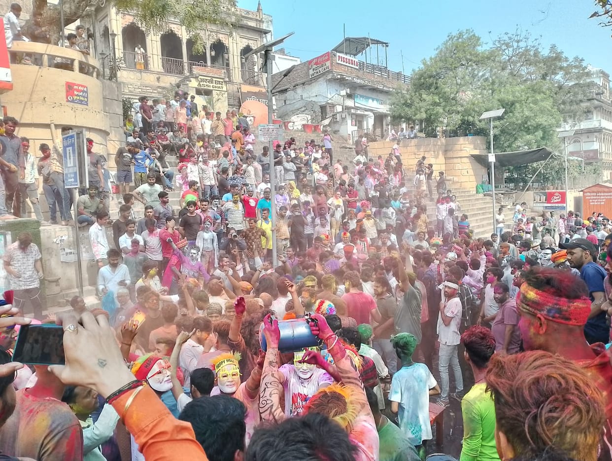 Holi 2024 celebration and fun on Ganga ghats in Kashi